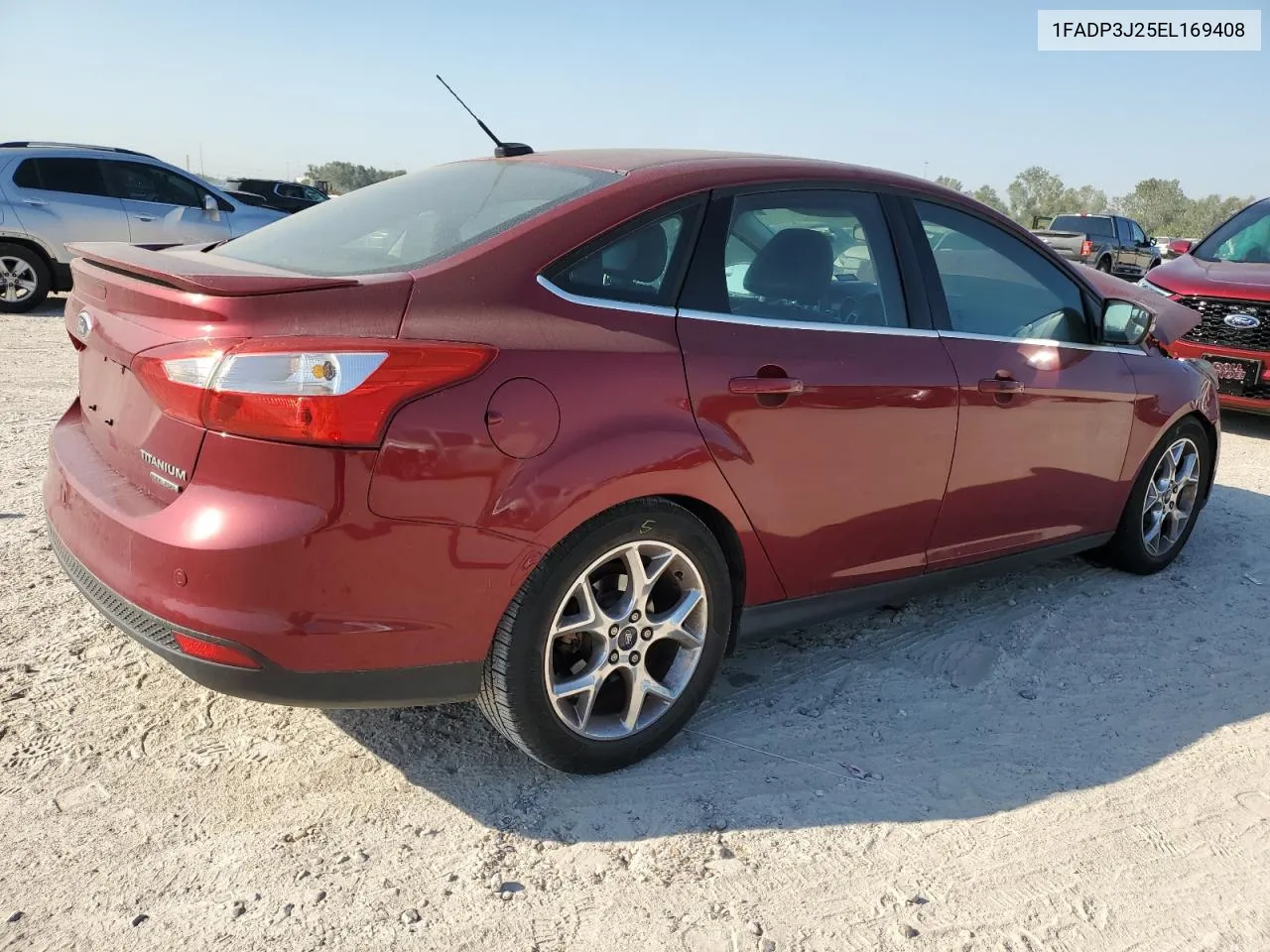 2014 Ford Focus Titanium VIN: 1FADP3J25EL169408 Lot: 73581114