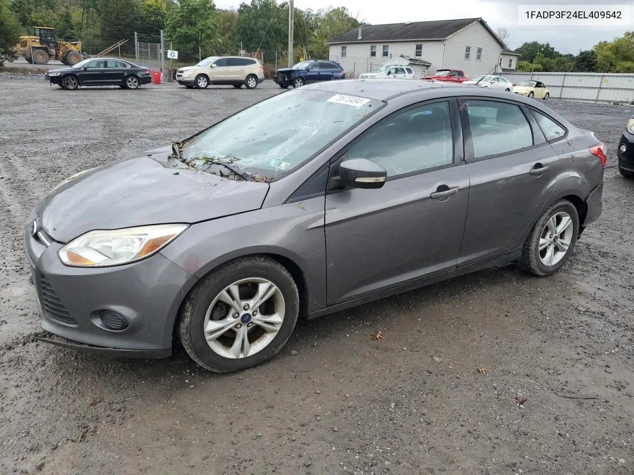 2014 Ford Focus Se VIN: 1FADP3F24EL409542 Lot: 73673494