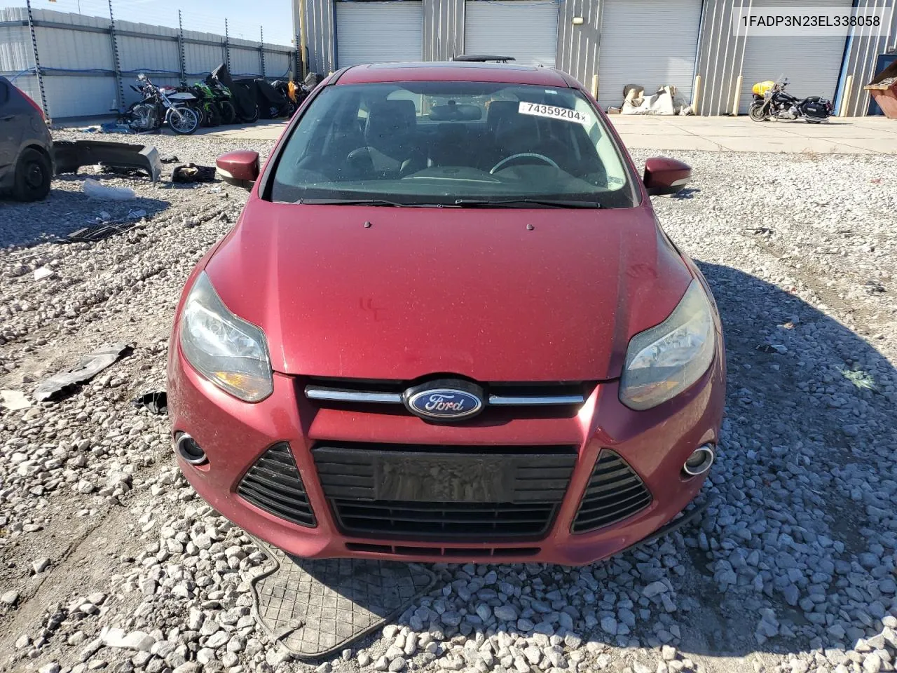 2014 Ford Focus Titanium VIN: 1FADP3N23EL338058 Lot: 74359204