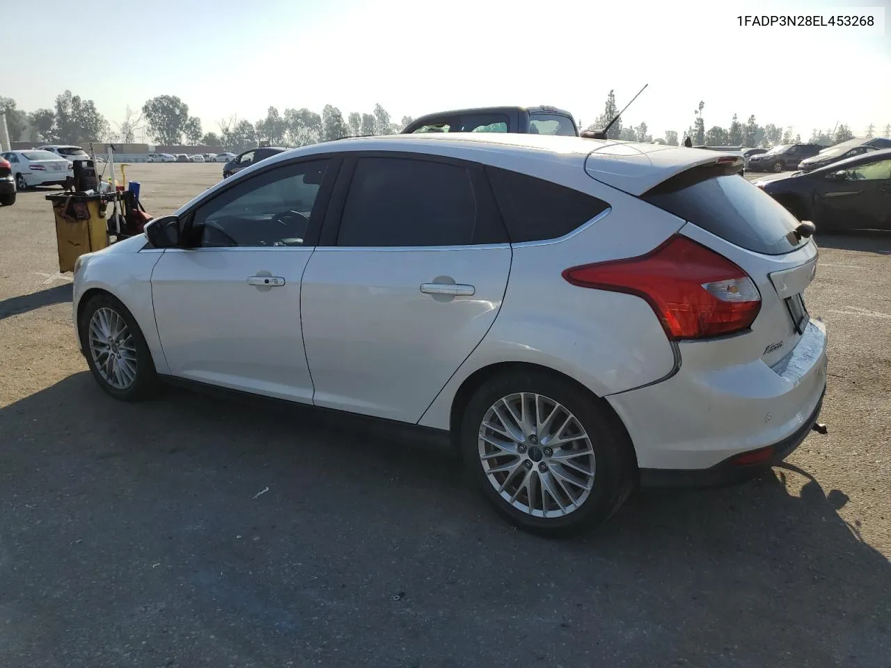 2014 Ford Focus Titanium VIN: 1FADP3N28EL453268 Lot: 74564284