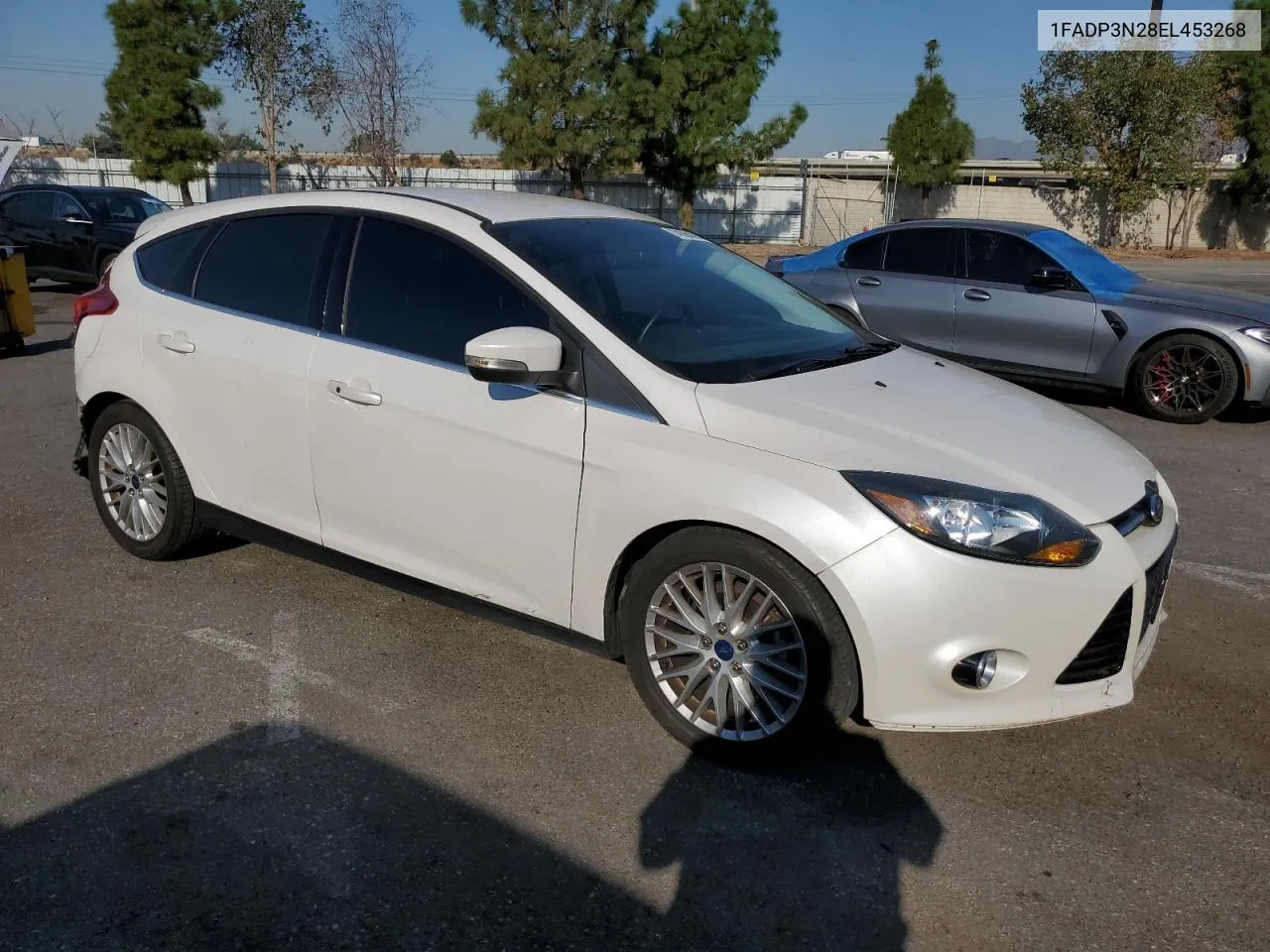 2014 Ford Focus Titanium VIN: 1FADP3N28EL453268 Lot: 74564284