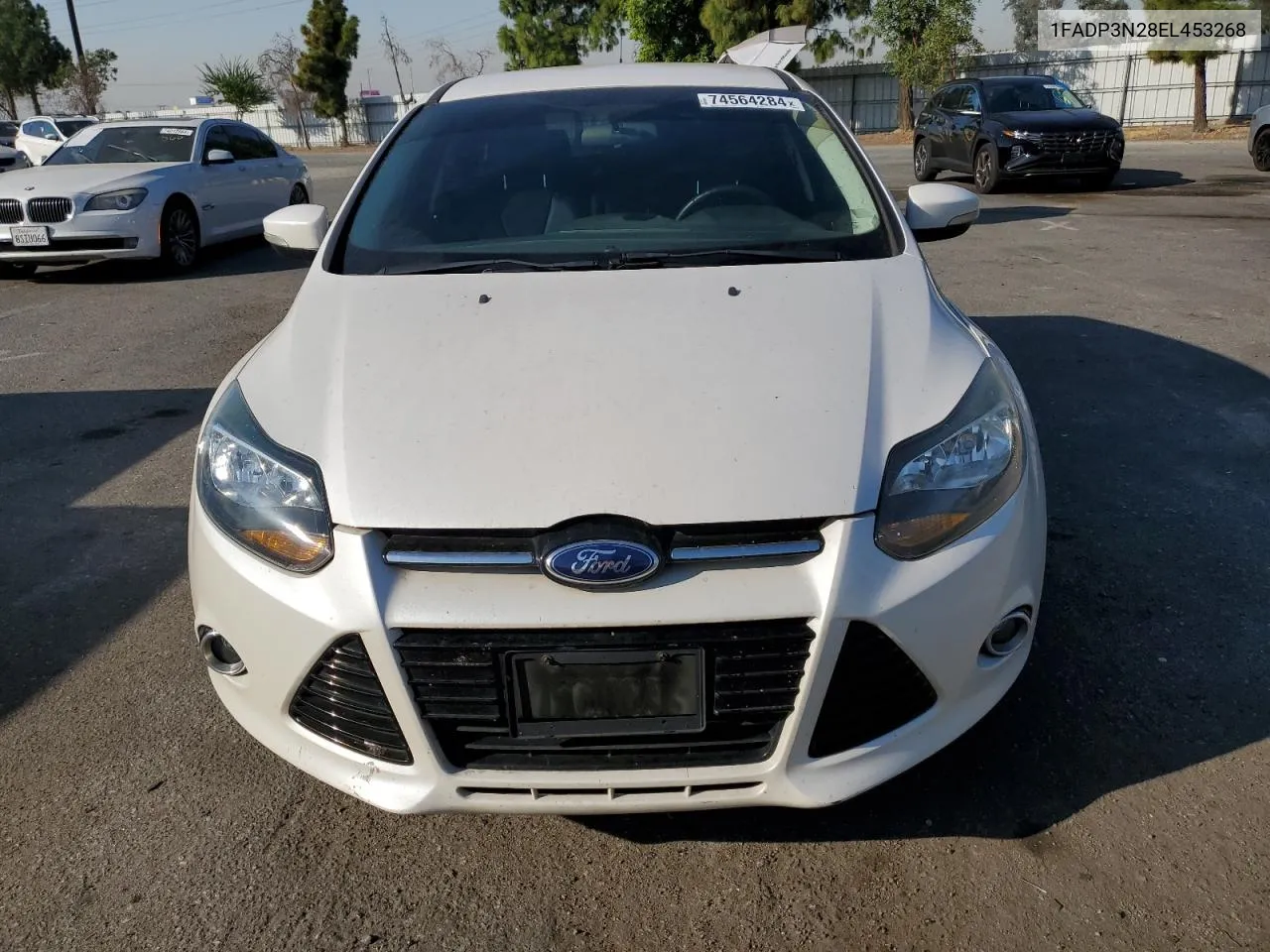 2014 Ford Focus Titanium VIN: 1FADP3N28EL453268 Lot: 74564284