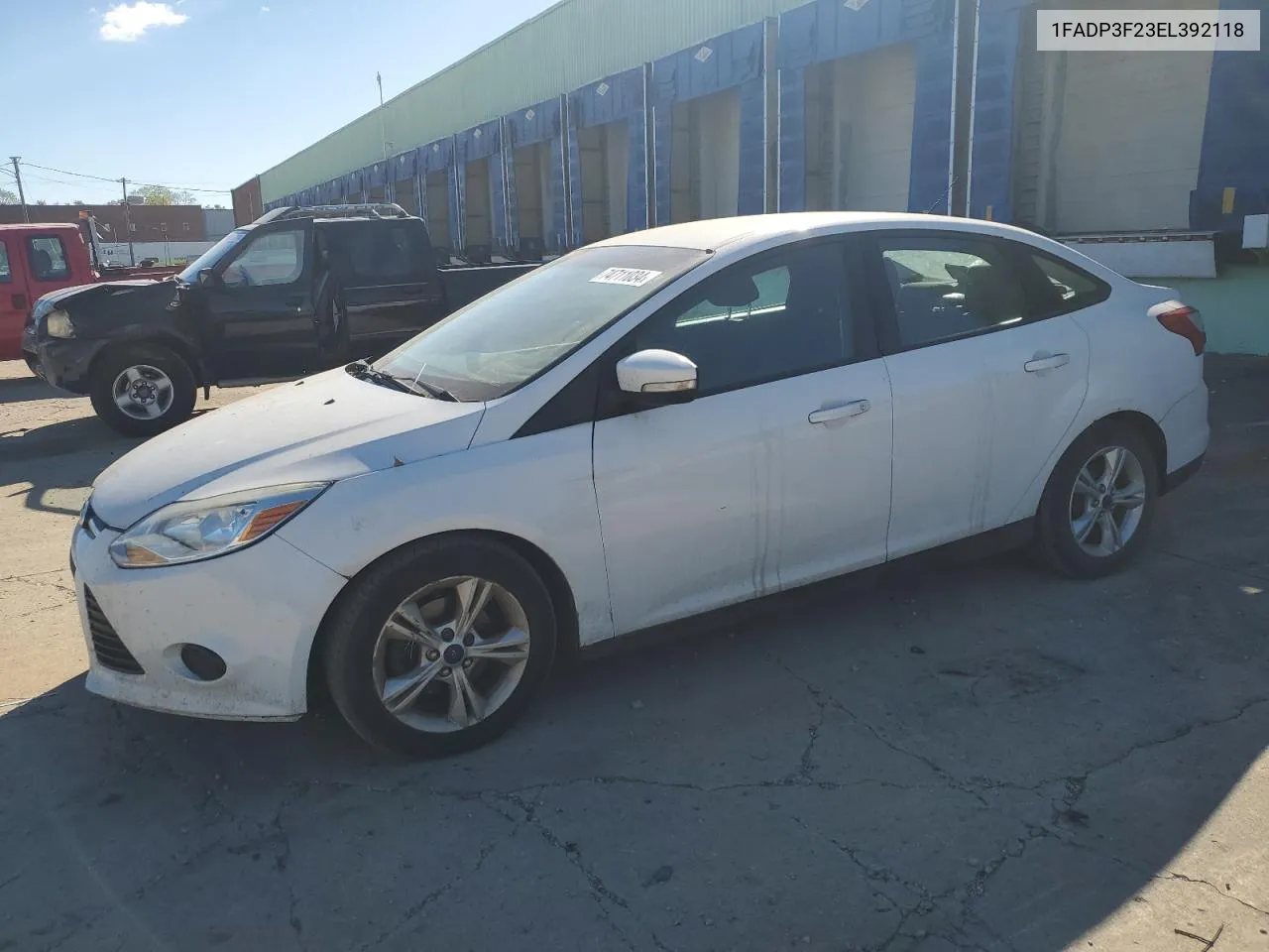 2014 Ford Focus Se VIN: 1FADP3F23EL392118 Lot: 74711034