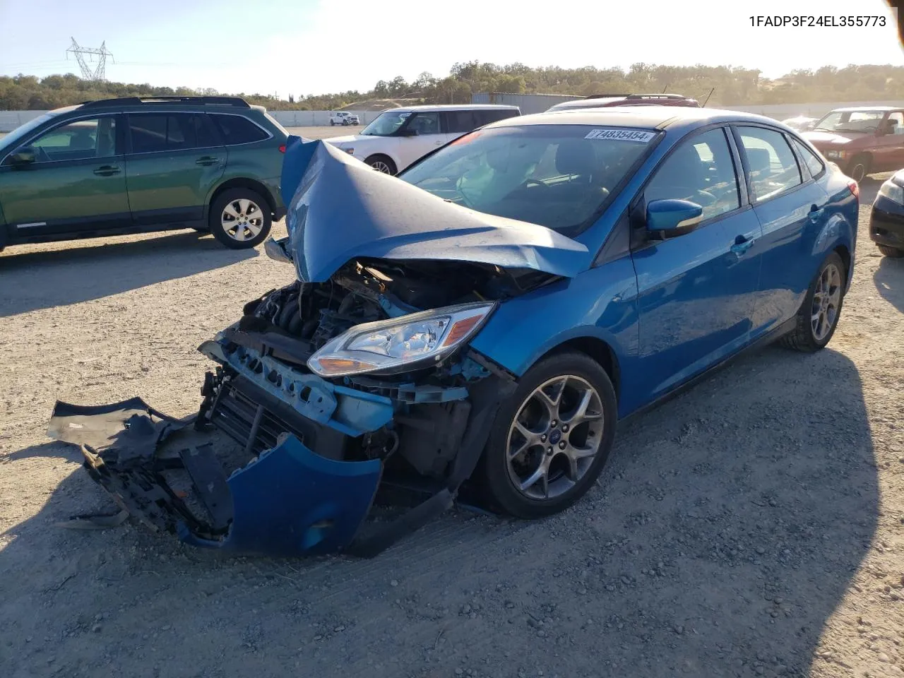 2014 Ford Focus Se VIN: 1FADP3F24EL355773 Lot: 74835454