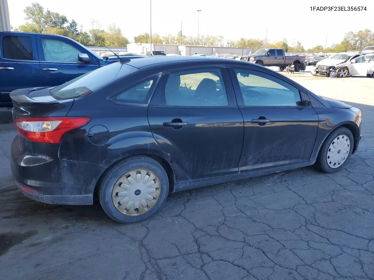 2014 Ford Focus Se VIN: 1FADP3F23EL356574 Lot: 74985814