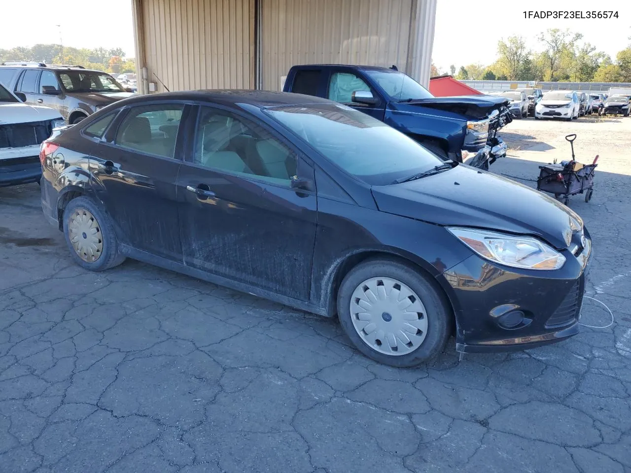 2014 Ford Focus Se VIN: 1FADP3F23EL356574 Lot: 74985814