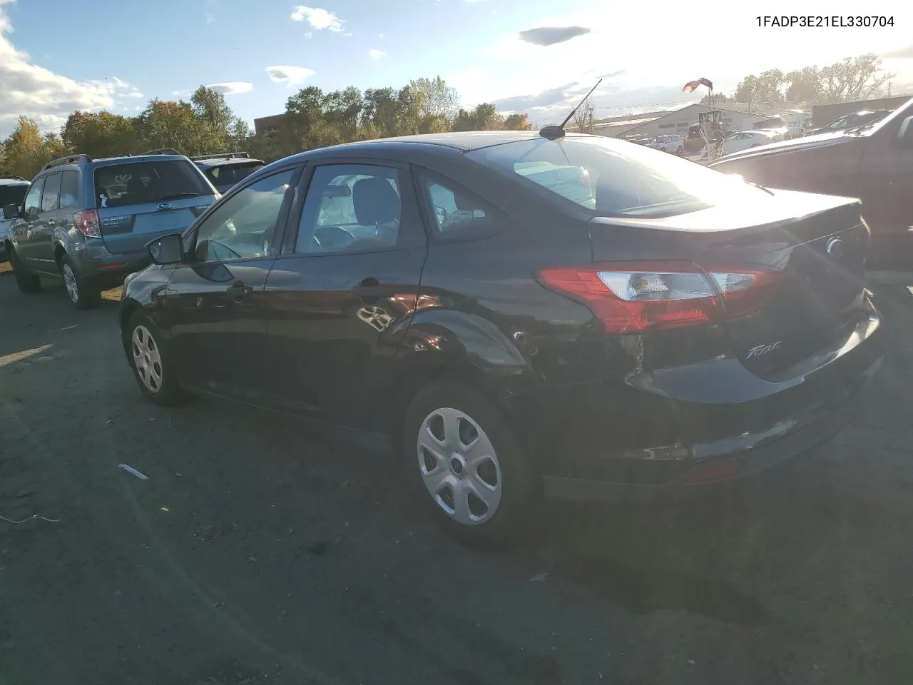 2014 Ford Focus S VIN: 1FADP3E21EL330704 Lot: 75298994