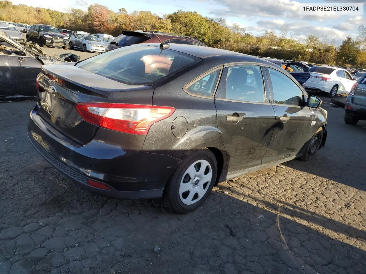 2014 Ford Focus S VIN: 1FADP3E21EL330704 Lot: 75298994