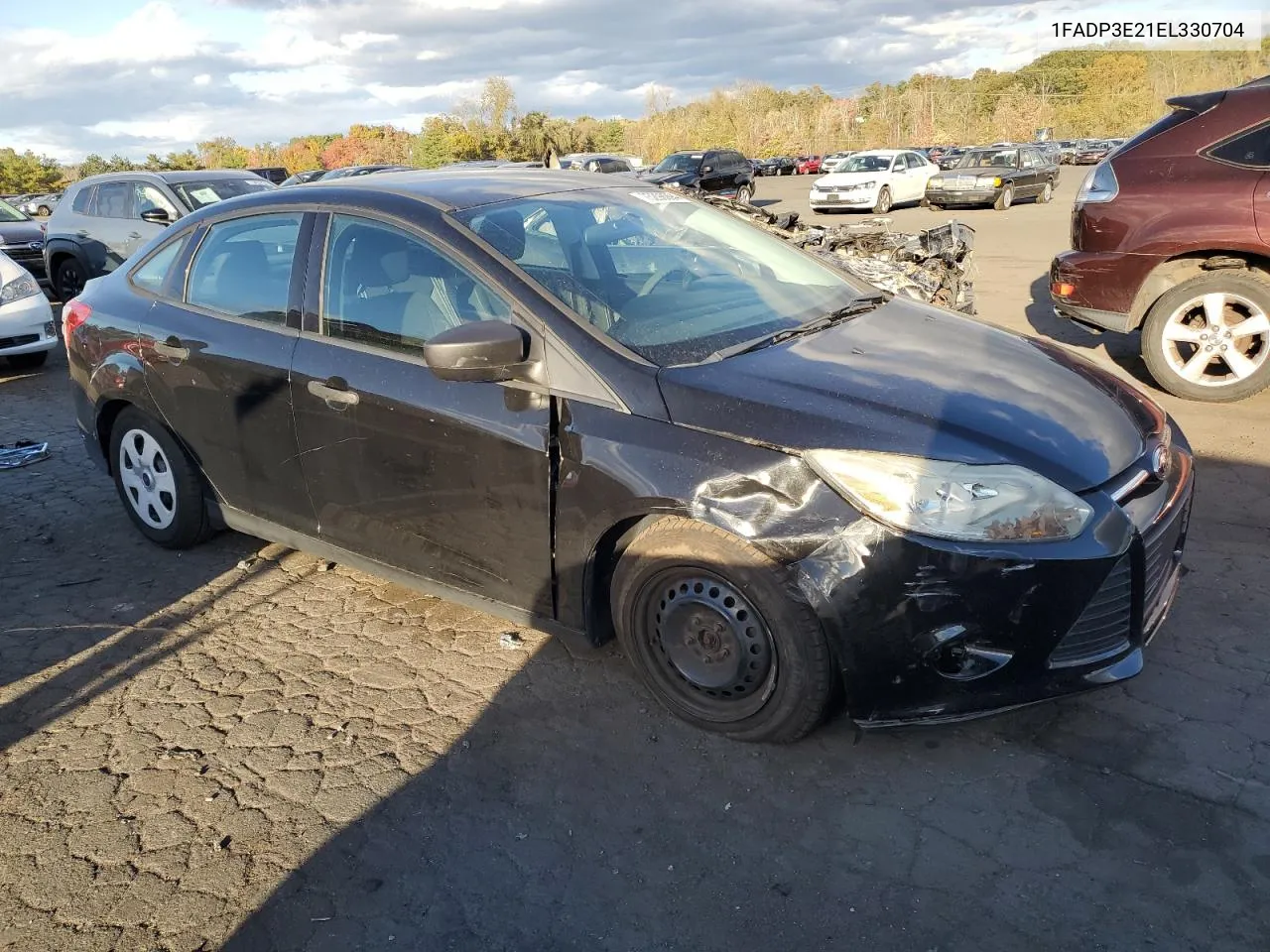 2014 Ford Focus S VIN: 1FADP3E21EL330704 Lot: 75298994