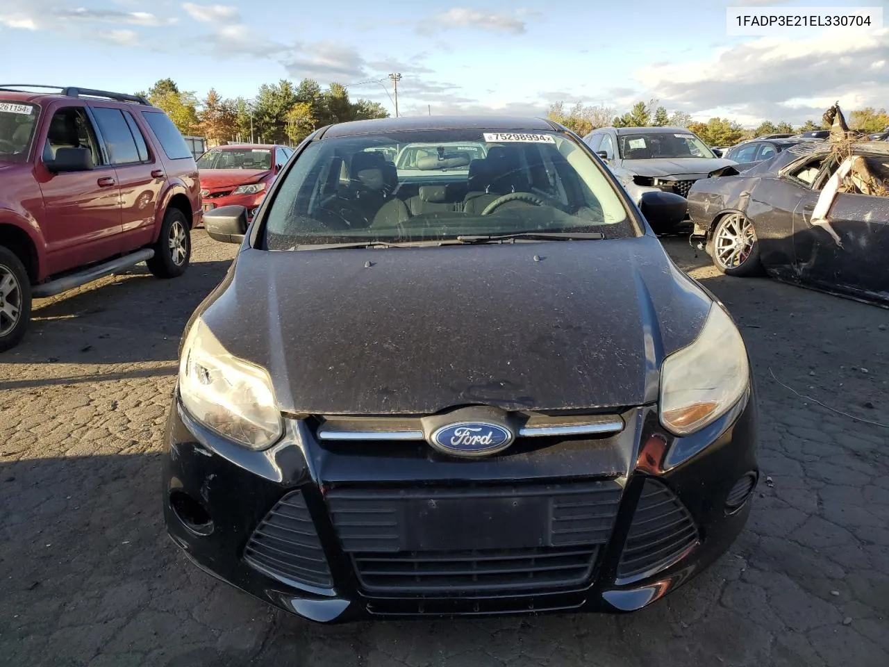 2014 Ford Focus S VIN: 1FADP3E21EL330704 Lot: 75298994