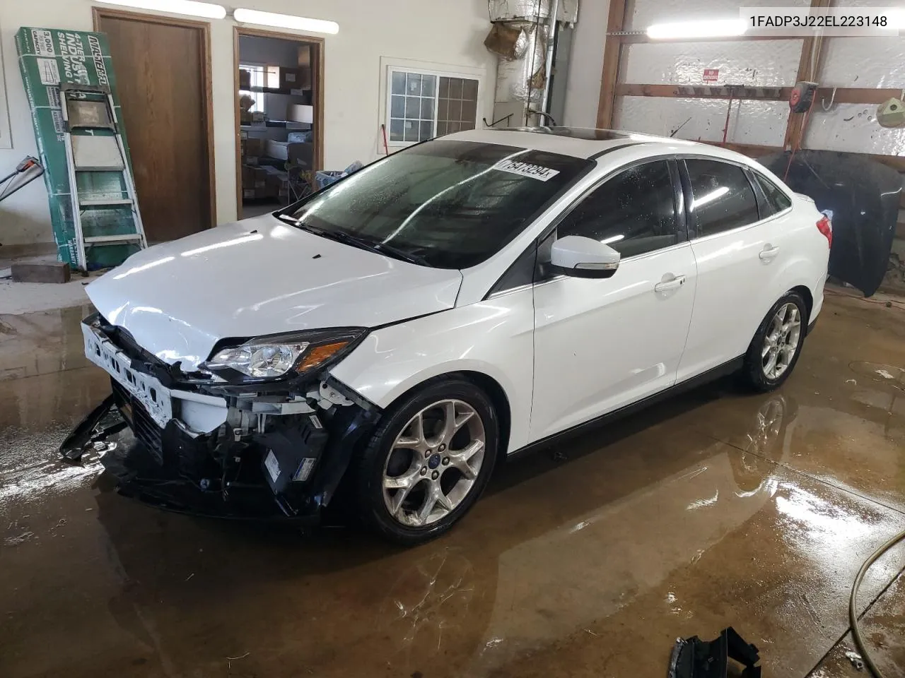 2014 Ford Focus Titanium VIN: 1FADP3J22EL223148 Lot: 75473294