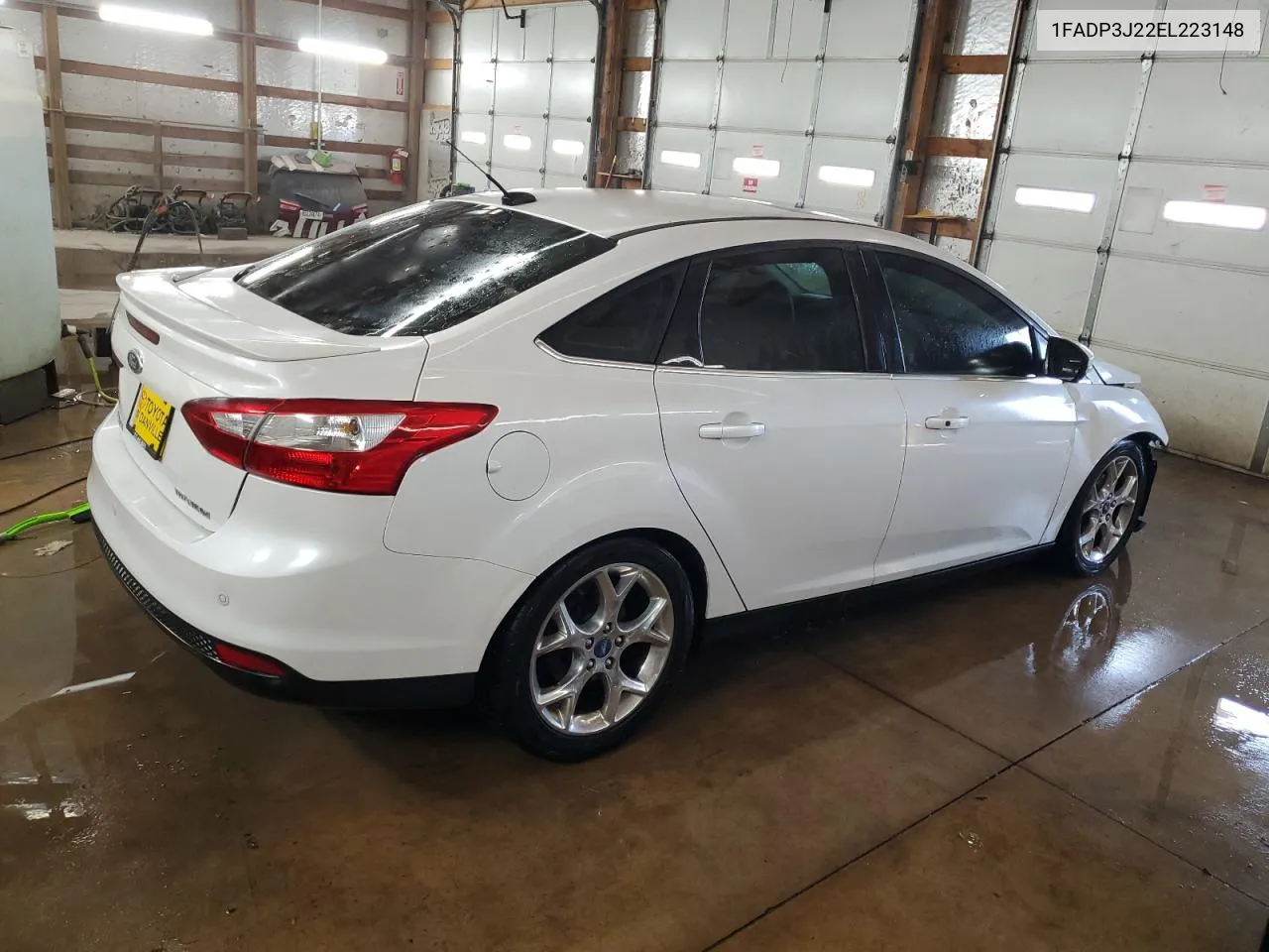 2014 Ford Focus Titanium VIN: 1FADP3J22EL223148 Lot: 75473294