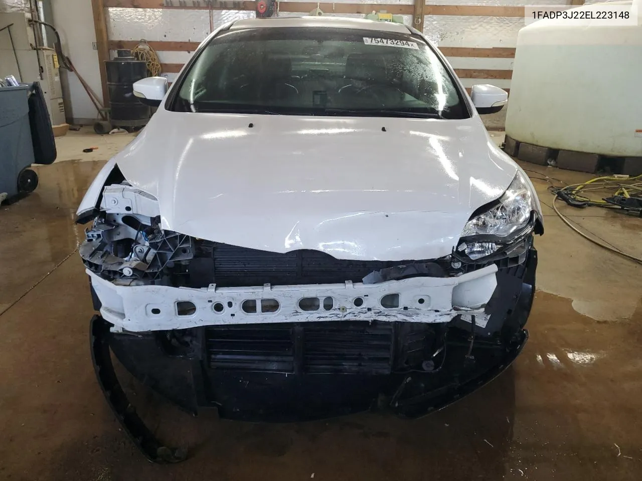 2014 Ford Focus Titanium VIN: 1FADP3J22EL223148 Lot: 75473294