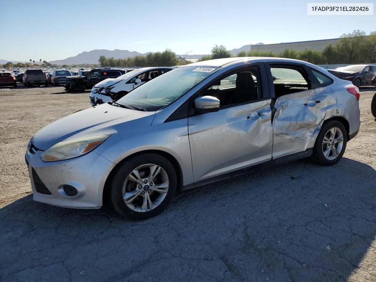 2014 Ford Focus Se VIN: 1FADP3F21EL282426 Lot: 75710884