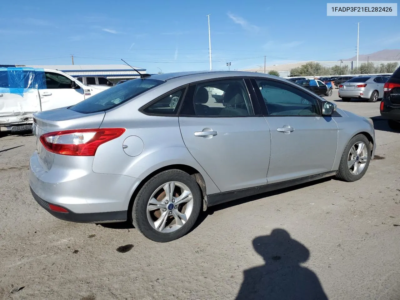 2014 Ford Focus Se VIN: 1FADP3F21EL282426 Lot: 75710884