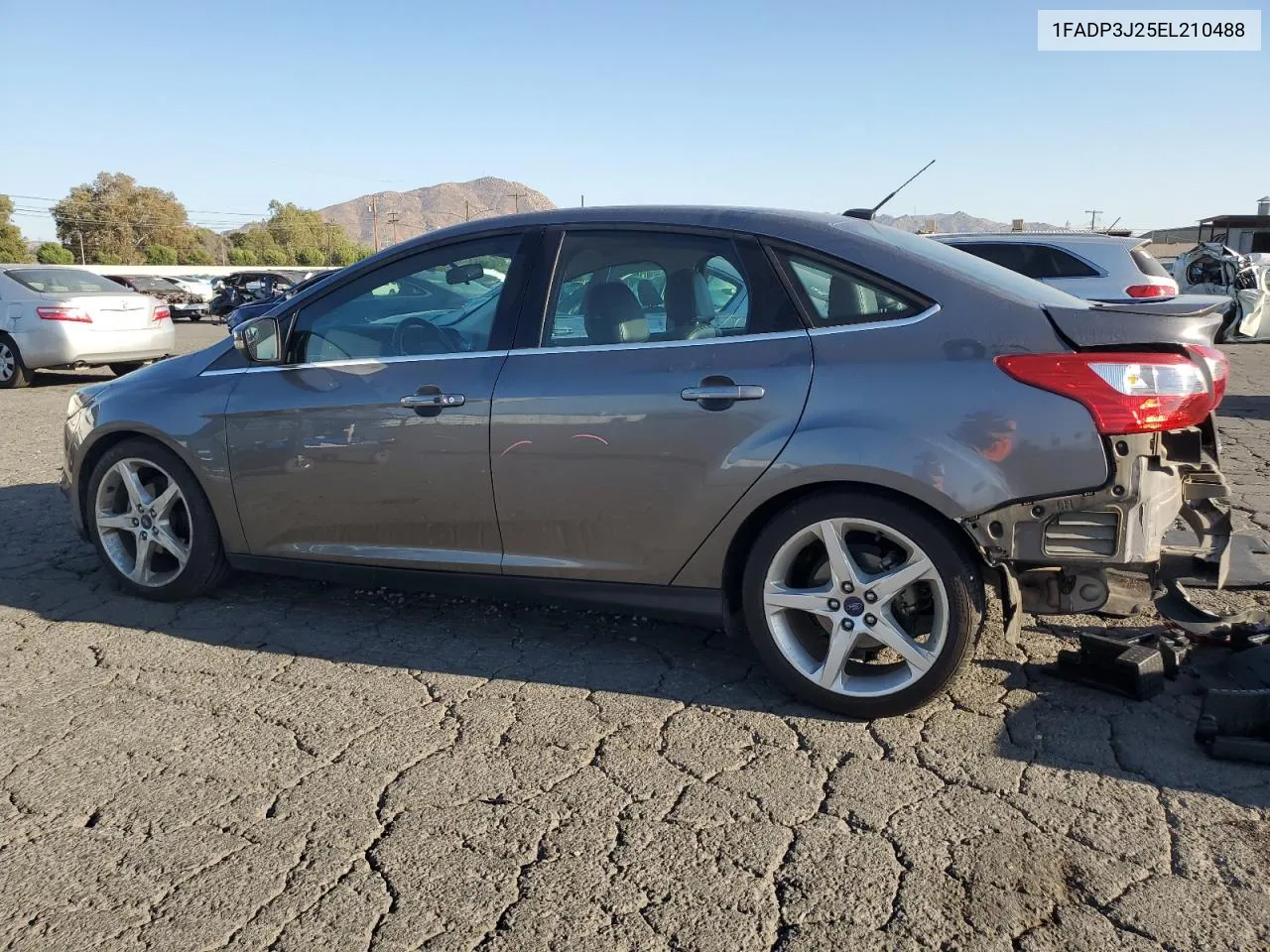 2014 Ford Focus Titanium VIN: 1FADP3J25EL210488 Lot: 75741454