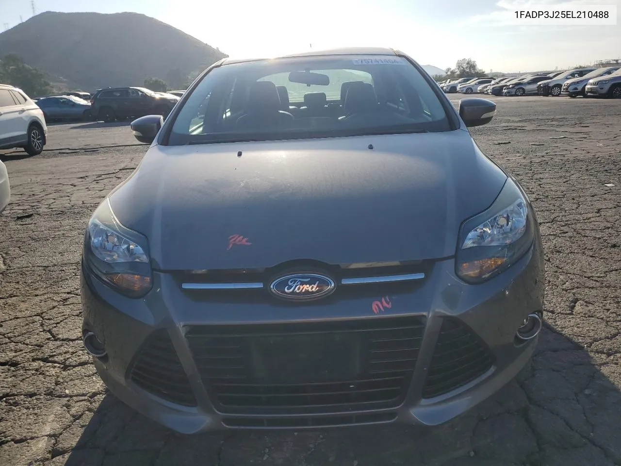 2014 Ford Focus Titanium VIN: 1FADP3J25EL210488 Lot: 75741454