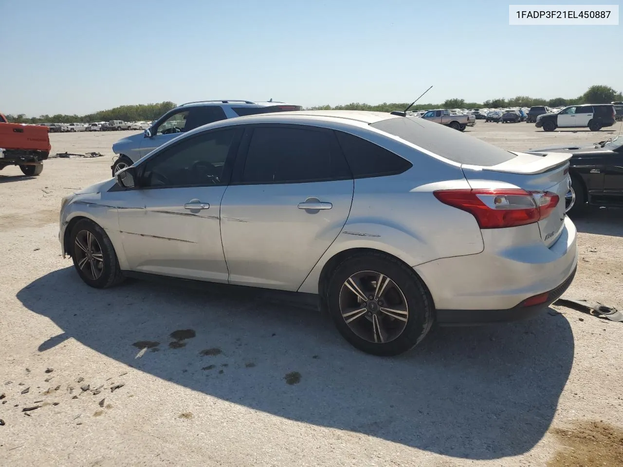 2014 Ford Focus Se VIN: 1FADP3F21EL450887 Lot: 75768174