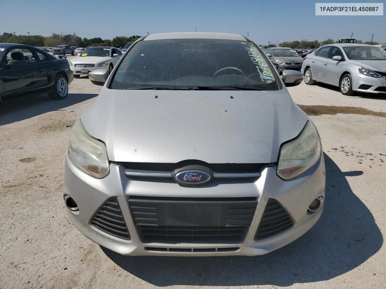 2014 Ford Focus Se VIN: 1FADP3F21EL450887 Lot: 75768174