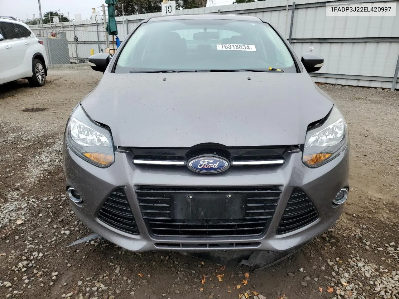 2014 Ford Focus Titanium VIN: 1FADP3J22EL420997 Lot: 76318834