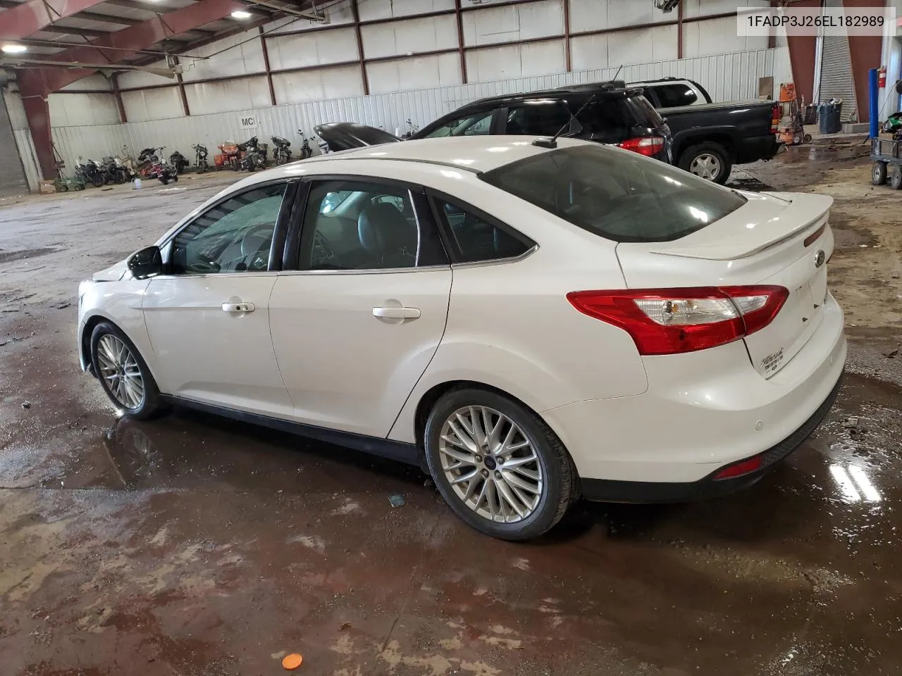 2014 Ford Focus Titanium VIN: 1FADP3J26EL182989 Lot: 76480334