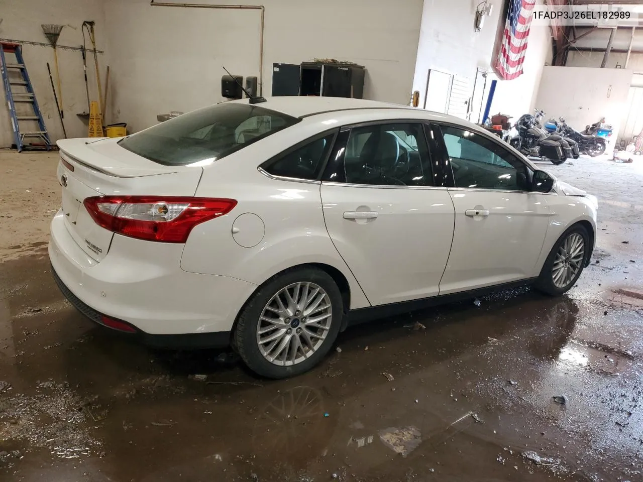 2014 Ford Focus Titanium VIN: 1FADP3J26EL182989 Lot: 76480334