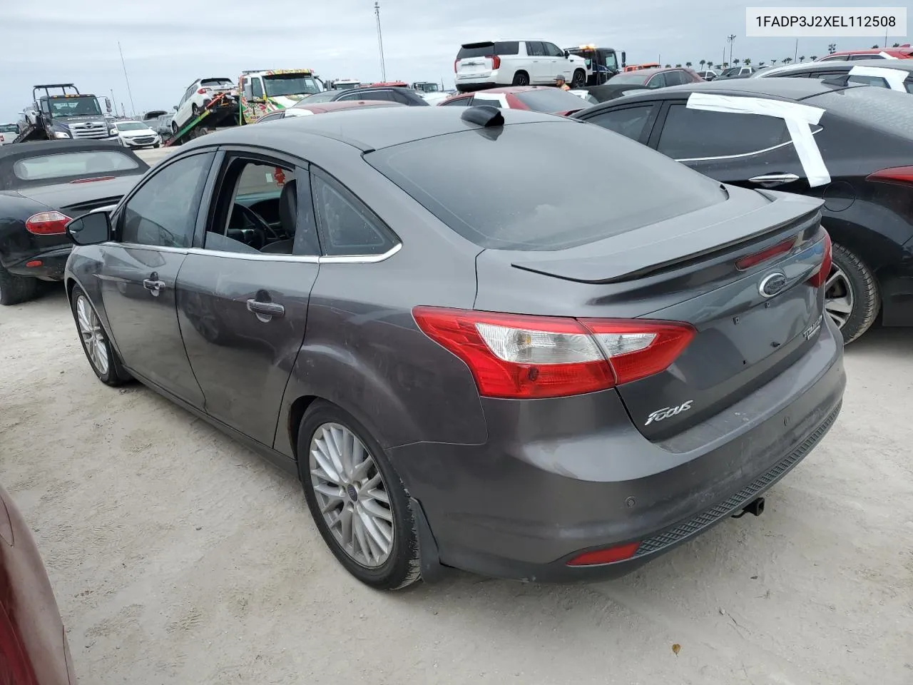 2014 Ford Focus Titanium VIN: 1FADP3J2XEL112508 Lot: 76796824