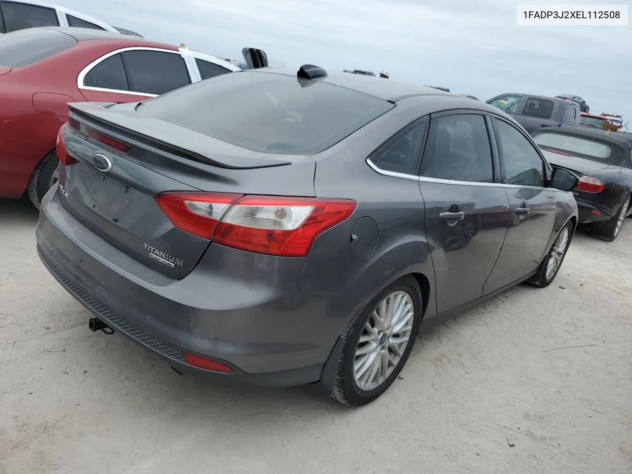 2014 Ford Focus Titanium VIN: 1FADP3J2XEL112508 Lot: 76796824