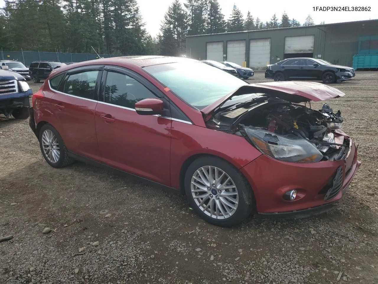 2014 Ford Focus Titanium VIN: 1FADP3N24EL382862 Lot: 77356354