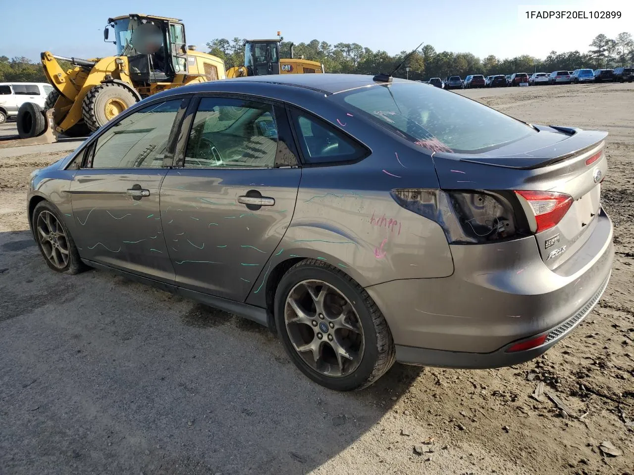 2014 Ford Focus Se VIN: 1FADP3F20EL102899 Lot: 77818984