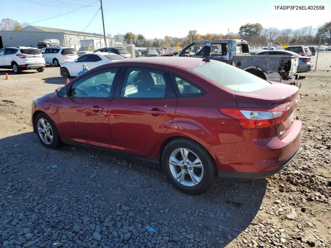 2014 Ford Focus Se VIN: 1FADP3F26EL402558 Lot: 77984614