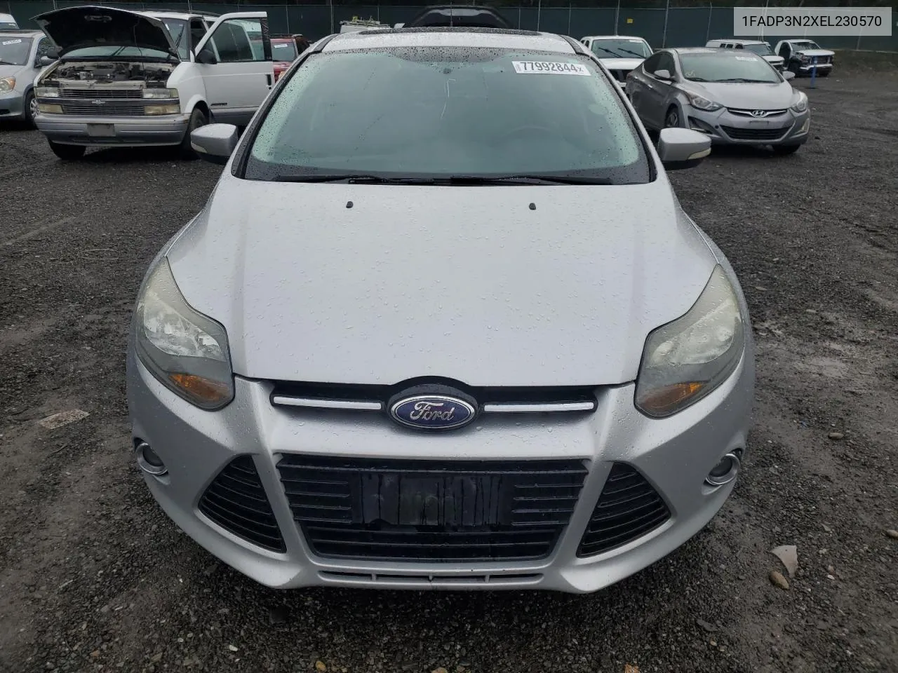 2014 Ford Focus Titanium VIN: 1FADP3N2XEL230570 Lot: 77992844