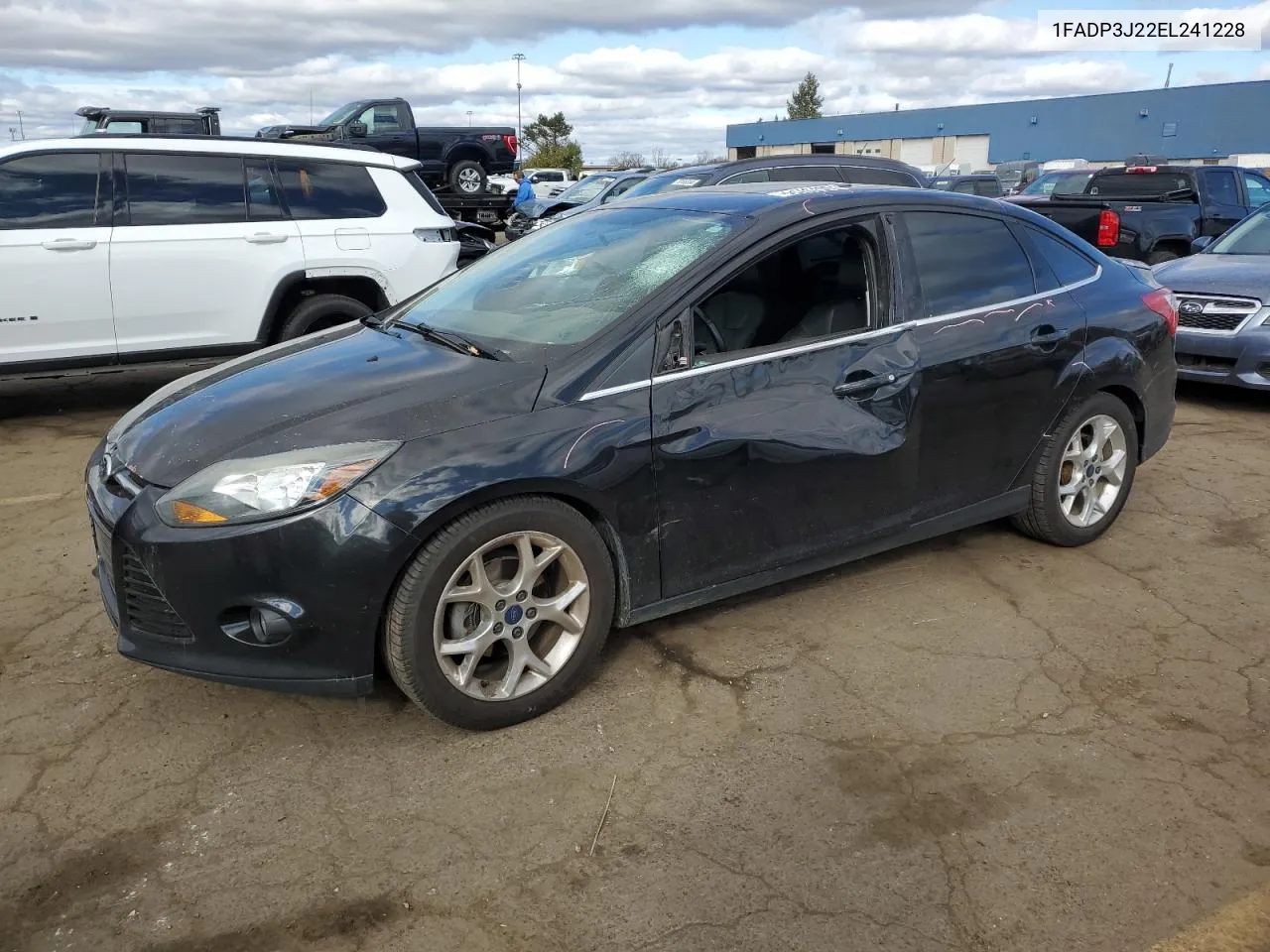 2014 Ford Focus Titanium VIN: 1FADP3J22EL241228 Lot: 78575794