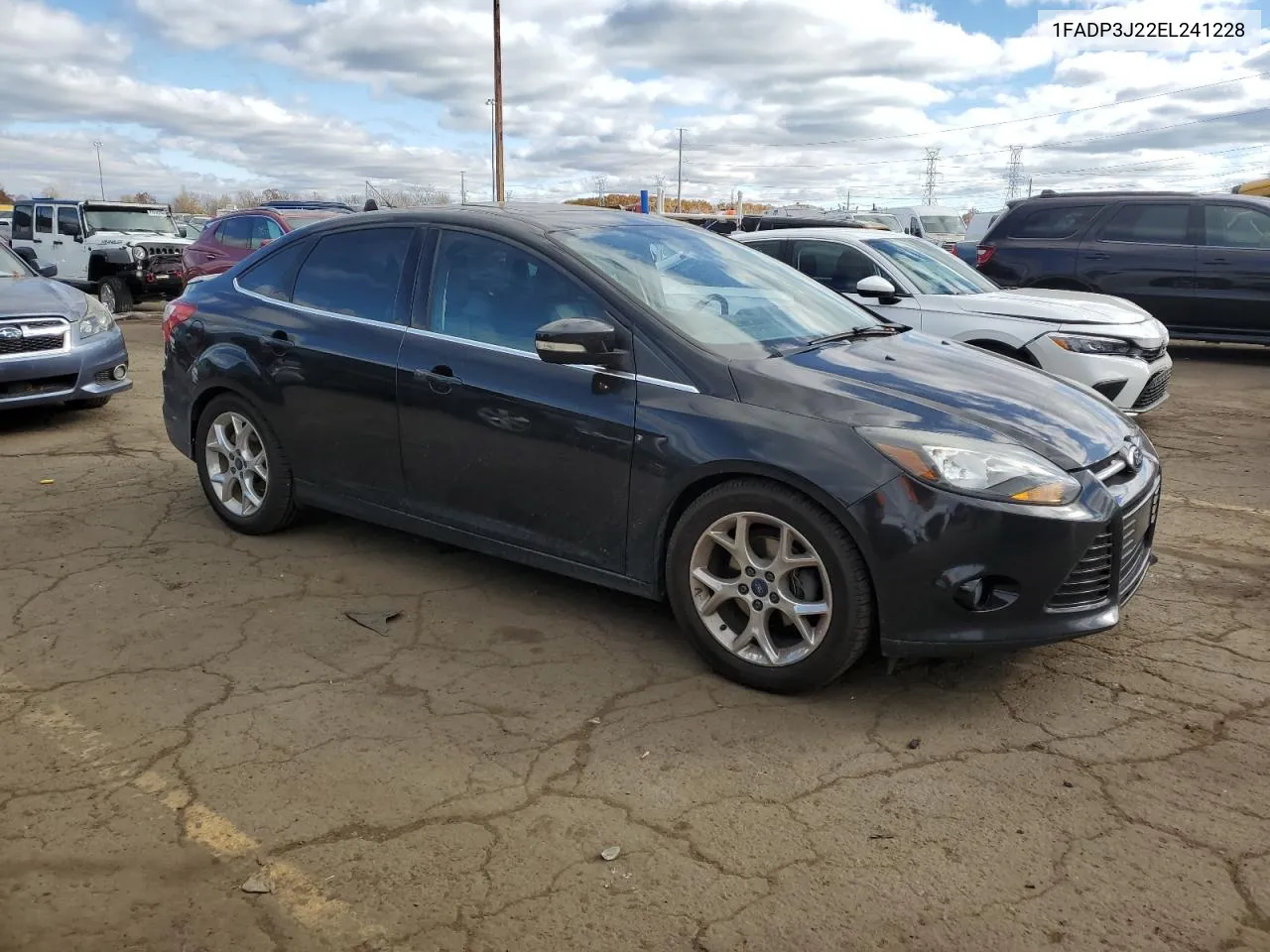 2014 Ford Focus Titanium VIN: 1FADP3J22EL241228 Lot: 78575794