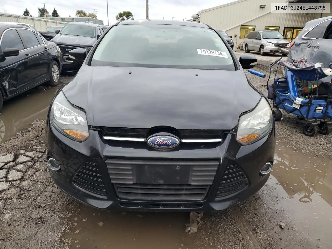 2014 Ford Focus Titanium VIN: 1FADP3J24EL448798 Lot: 79129734