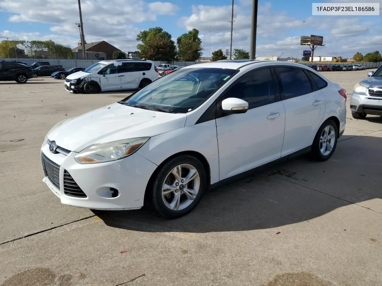 2014 Ford Focus Se VIN: 1FADP3F23EL186586 Lot: 79531564