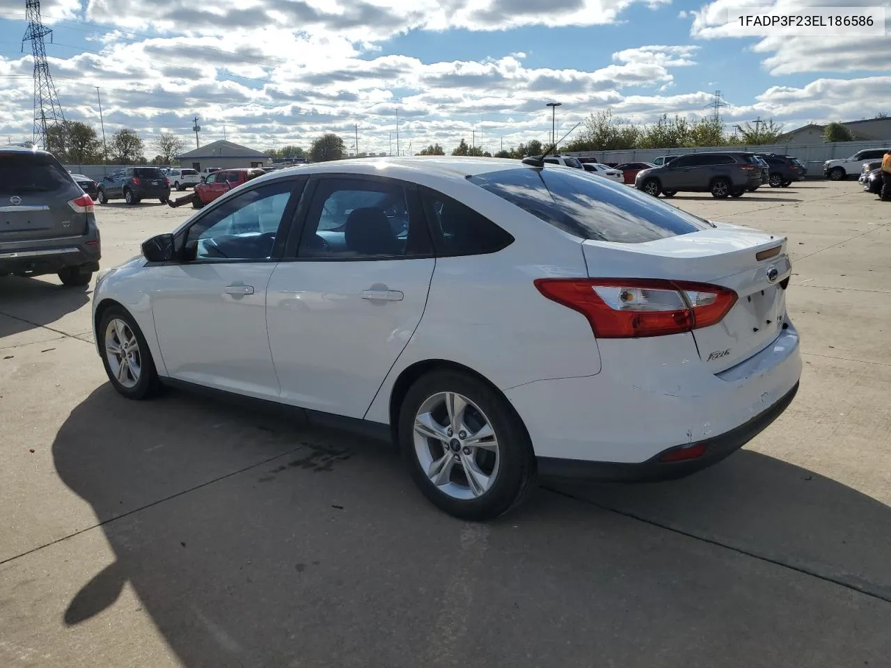 2014 Ford Focus Se VIN: 1FADP3F23EL186586 Lot: 79531564