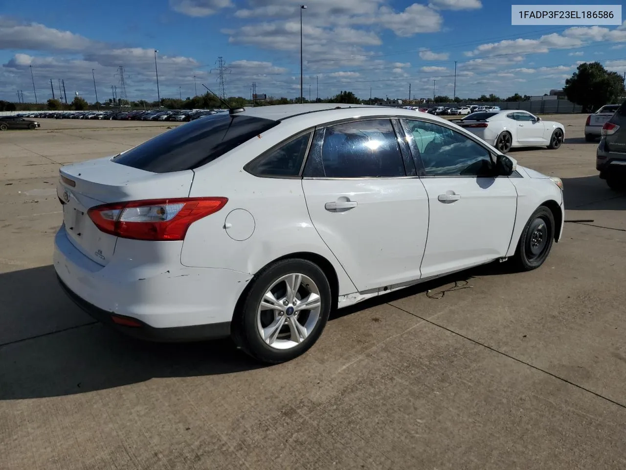 2014 Ford Focus Se VIN: 1FADP3F23EL186586 Lot: 79531564