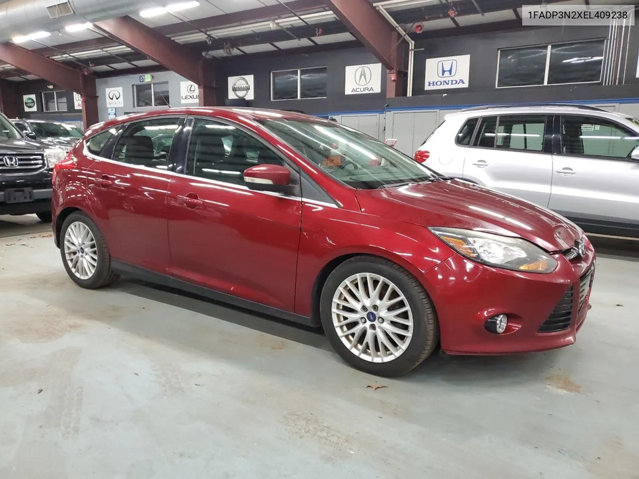 2014 Ford Focus Titanium VIN: 1FADP3N2XEL409238 Lot: 80840844