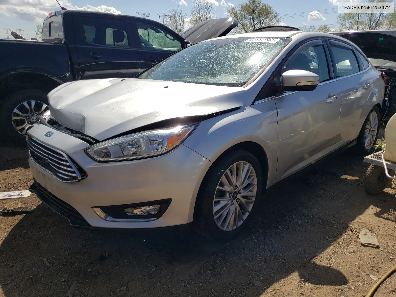 2015 Ford Focus Titanium VIN: 1FADP3J25FL253472 Lot: 52117944