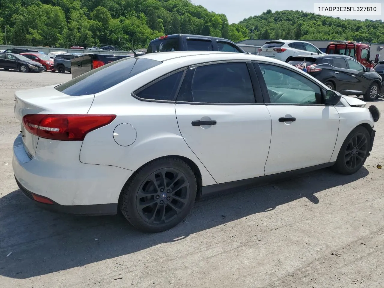 2015 Ford Focus S VIN: 1FADP3E25FL327810 Lot: 55879444