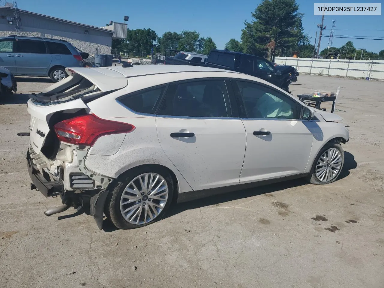 2015 Ford Focus Titanium VIN: 1FADP3N25FL237427 Lot: 58881424