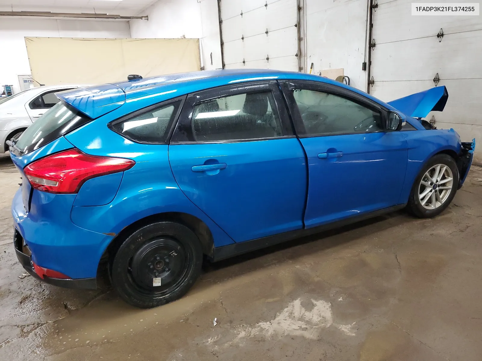 2015 Ford Focus Se VIN: 1FADP3K21FL374255 Lot: 62020454