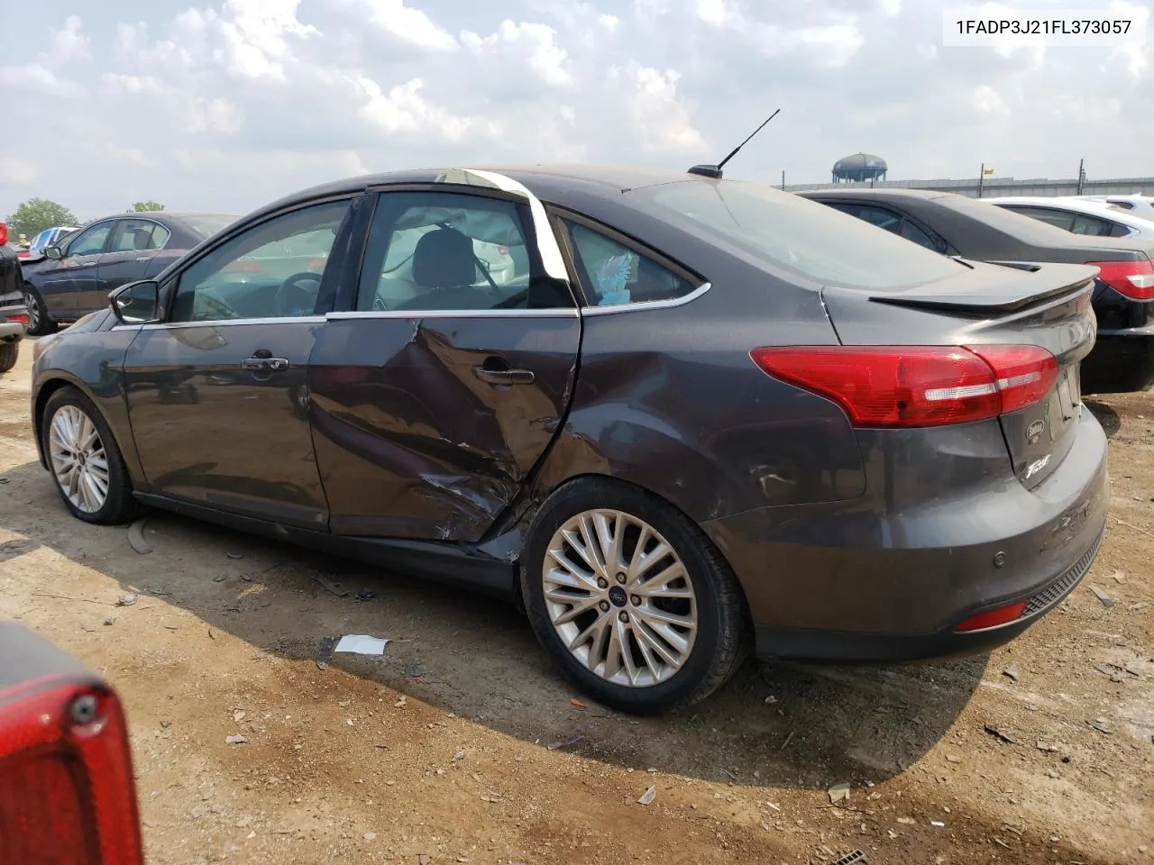 2015 Ford Focus Titanium VIN: 1FADP3J21FL373057 Lot: 62903834