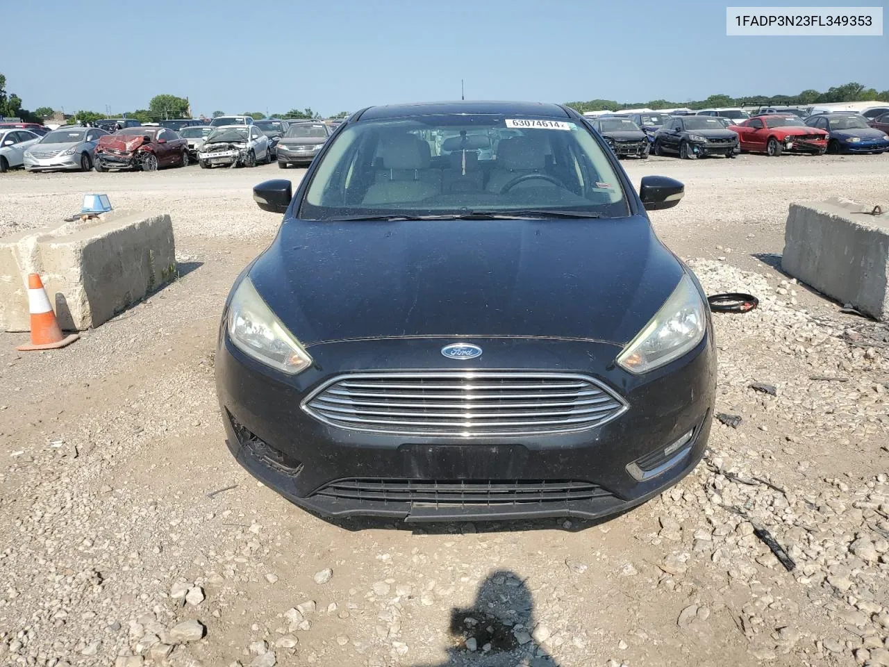 2015 Ford Focus Titanium VIN: 1FADP3N23FL349353 Lot: 63074614