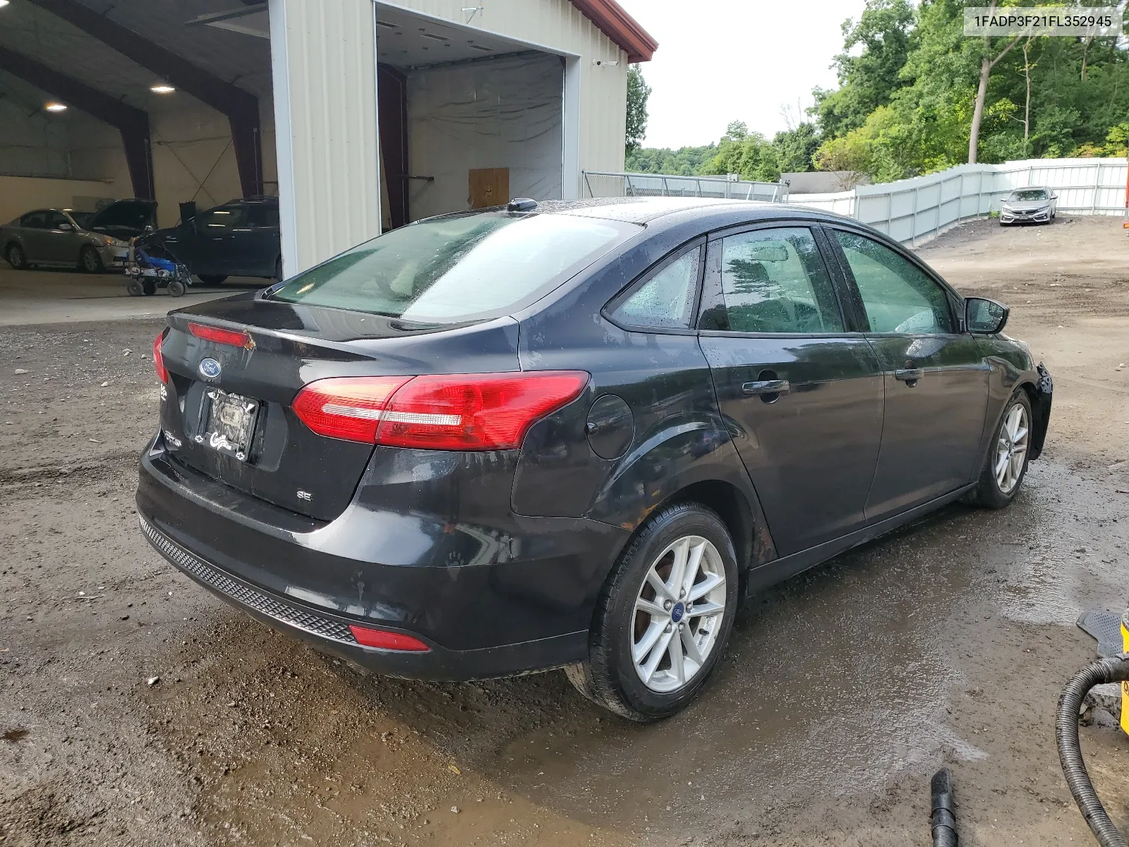 2015 Ford Focus Se VIN: 1FADP3F21FL352945 Lot: 64258804