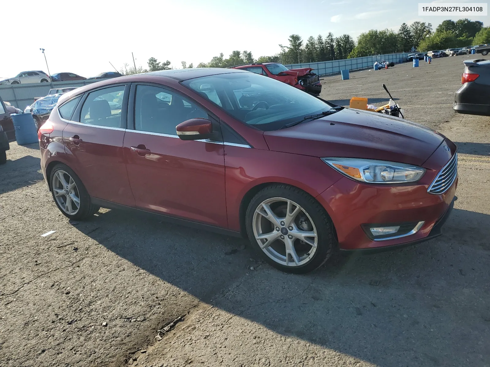 2015 Ford Focus Titanium VIN: 1FADP3N27FL304108 Lot: 65801994