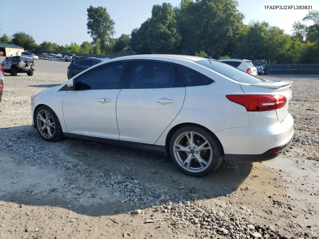 2015 Ford Focus Titanium VIN: 1FADP3J2XFL383831 Lot: 66147864