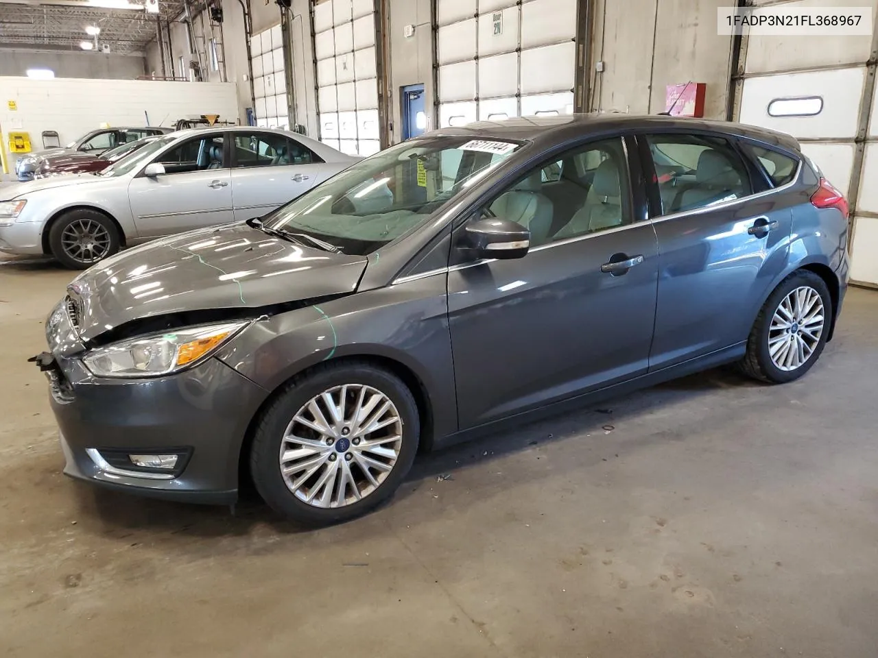 2015 Ford Focus Titanium VIN: 1FADP3N21FL368967 Lot: 66711144