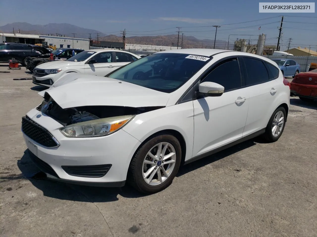 2015 Ford Focus Se VIN: 1FADP3K23FL282371 Lot: 66792704